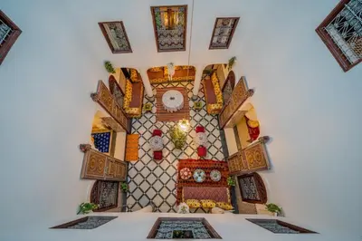 a wall with a mosaic design on it at Riad Chams Fes in Fès