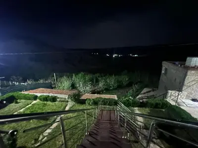 a view from the observatory at night at auberge panorama ouiouane in Kasba des Aït Athmane