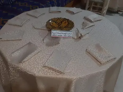 a table with a white cake on top of it at شمس ميبلادن Tafoukt N' Mibladen in Midelt