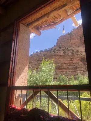a window in a room with a view of a mountain at Gite Ifoulou Tassaout in Ifoulou