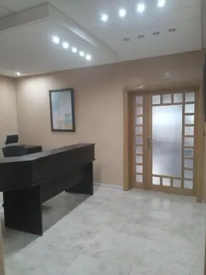 a room with a black piano and a door at Villa Alhambra in Fès