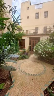 a courtyard in front of a building at JNANE RBATI Apartement in Fès