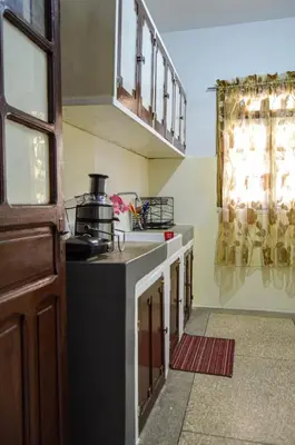a kitchen with a sink and a stove top oven at dar sara medina fes in Fès