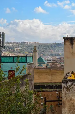 a view of a city from the top of a building at dar sara medina fes in Fès