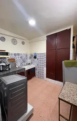a kitchen with a stove and a counter top at Appartement Old Medina fes in Fès