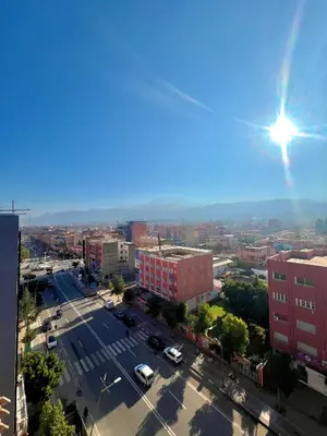an aerial view of a city with a street at app luxe in Beni Mellal