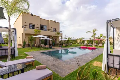 an image of a villa with a swimming pool at Villa Hasard Marrakech in Had Abdallah Rhiat
