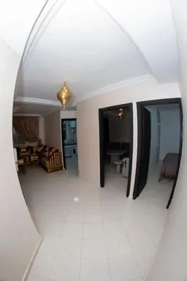a view of a living room through a mirror at Royal Deluxe Fez in Fès
