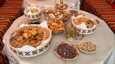 a table with many different types of food on it at Kasbat Taslit in Ouarzazate