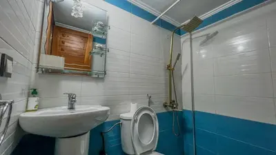 a bathroom with a toilet and a sink at My Amir in Fès