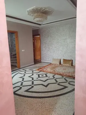 a room with a bed and a carpet on the floor at Luxurious mountain villa in El Ksiba