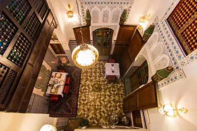 an overhead view of a hallway in a house with tiles at Casa Aya Medina in Fès