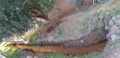 an aerial view of a creek with a bike on a hill at Momo's villa in Aït Ourir