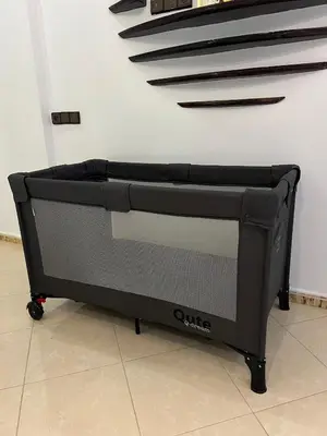 a tool cart sitting on a floor next to a wall at Spacious Family Apartment in Er Rachidia