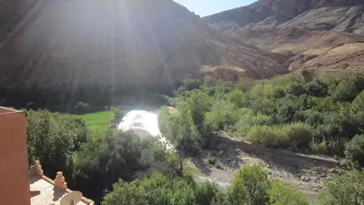 a view of a river in a canyon at La Belle étoile in Aït Oussane