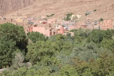 a town in the middle of a mountain at La Belle étoile in Aït Oussane