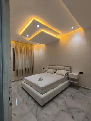 a bedroom with a large bed in a room at Haut standing apartment in hearth of fez in Fès