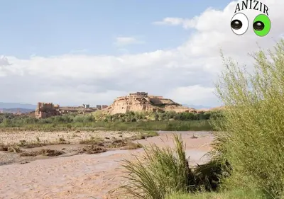 an image of a desert with eyes in the sky at Kasbah Anizir Itran in Kalaat MGouna