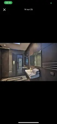 a bathroom with a sink and a mirror at Vila en fes in Fès