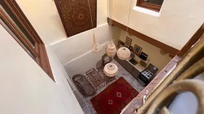 an overhead view of a room with a table and chairs at Dar Al Rcif in Station Bab Ftouh