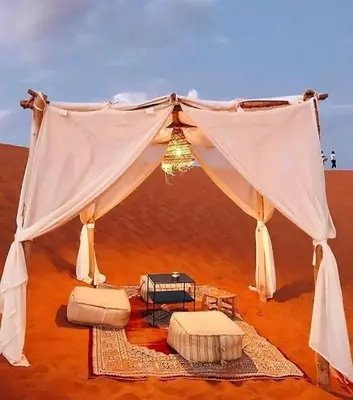 a tent in the middle of the desert at beststaysbylocal in Merzouga