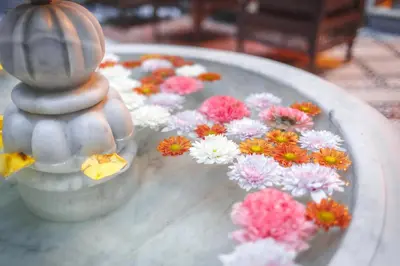 a bunch of flowers on top of a table at Riad Fes Maya suite & spa in Fès