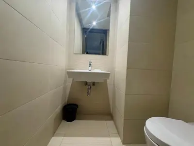 a bathroom with a sink and a toilet at Résidence Prestigia Fès centre - 3 chambres in Fès