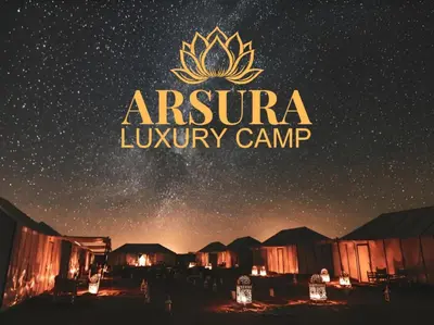 a starry night with a camp in the desert at Arsura Luxury Camp in Merzouga