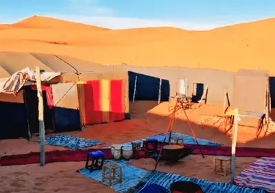 a tent in the middle of a desert at Merzouga Standard Camp in Merzouga