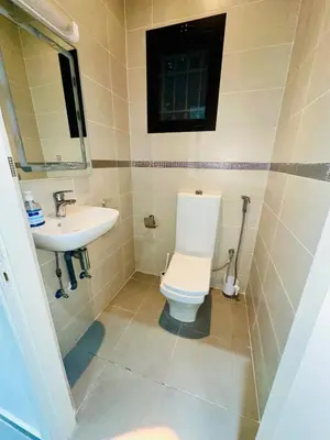 a bathroom with a toilet and a sink at Private Villa, Pool, Gym, Atlas View in Ourika