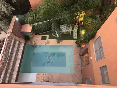 an overhead view of a swimming pool in a building at Private Villa, Pool, Gym, Atlas View in Ourika