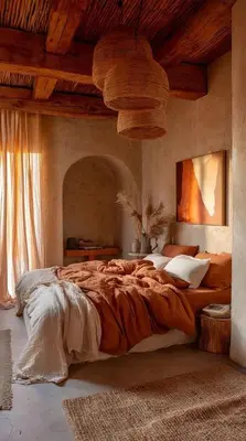 a bedroom with a large bed with a wooden ceiling at Riad hibat fes in Fès