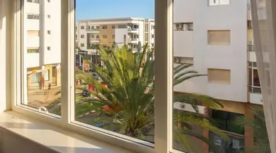 a window with a view of a city at Sunny get away in Agadir, Balcony and View in Oulad Akkou