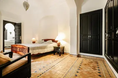 a bedroom with a bed in a room at Villa l'Aziza in Najem