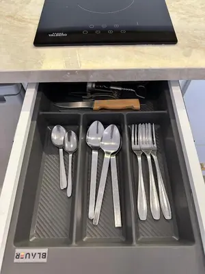 a drawer with utensils in a kitchen sink at Modern accommodation with Riad spirit in Hivernage in Oulad Akkou