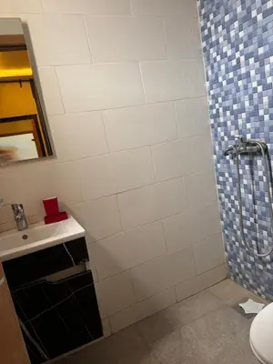 a bathroom with a shower and a sink at Family Villa with Panoramic View of Infinite Horizon in Ifrane