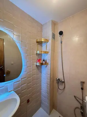 a bathroom with a shower and a sink at Warm & Stylish Boho Condo - 6 km to Old Medina in Fès