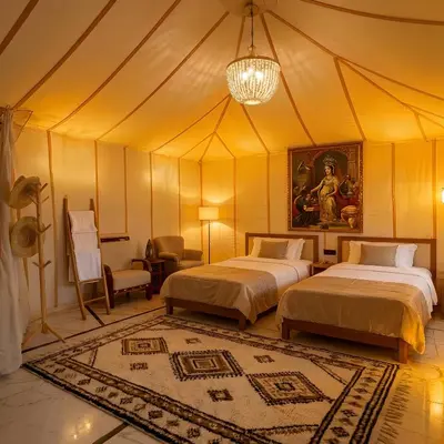 a bedroom with two beds in a tent at Saba Queen Camp in Khamliya