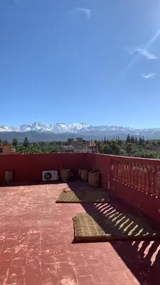 a balcony with a view of the mountains at Villa ourika in Aghmat