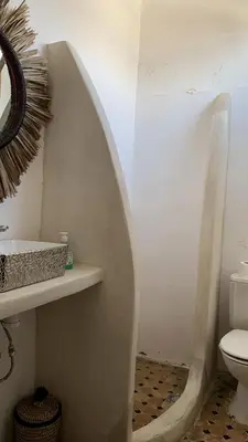 a bathroom with a sink and a toilet at Villa ourika in Aghmat