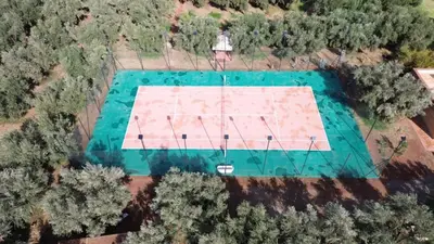 an overhead view of a swimming pool with trees at VIilla SOLANA Domaine LAMRAH in Oulad Snaguia
