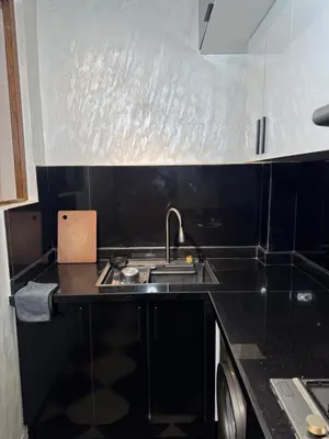 a kitchen with a sink and a counter top at Meknes Relax Home in Meknès