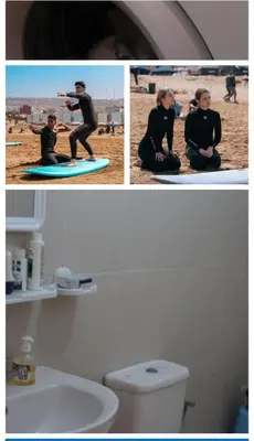 a man and a woman sitting on a surfboard on the beach at Apartment in Agadir in Oulad Akkou