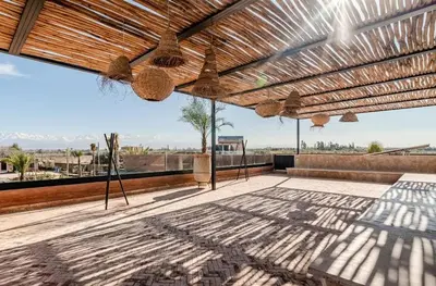 an open patio with a view of the desert at villa Bohème Chic in Had Abdallah Rhiat