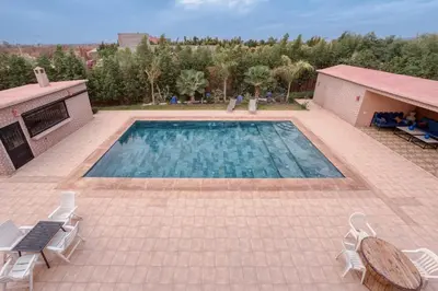 an overhead view of a swimming pool on a patio at Villa Memories 5bedrooms Space, laughter, relaxation in Marrakesh in Douar bel Rhanodour