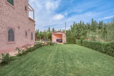 an empty yard next to a brick building at Villa Memories 5bedrooms Space, laughter, relaxation in Marrakesh in Douar bel Rhanodour