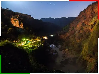 a view of a river in a valley at night at Cozy Apartment Near Ouzoud Waterfalls in Azilal