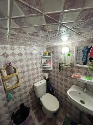 a bathroom with a toilet and a sink at فاس in Fès