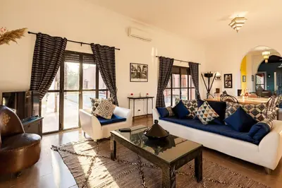 a living room with a couch and a table at Villa Tamara luxury villa private pool Marrakech in Najem