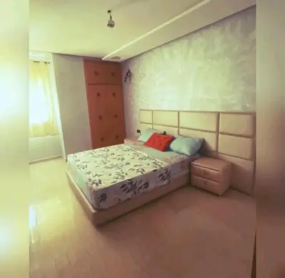 a bedroom with a bed in a room at إقامة حسن in Fès